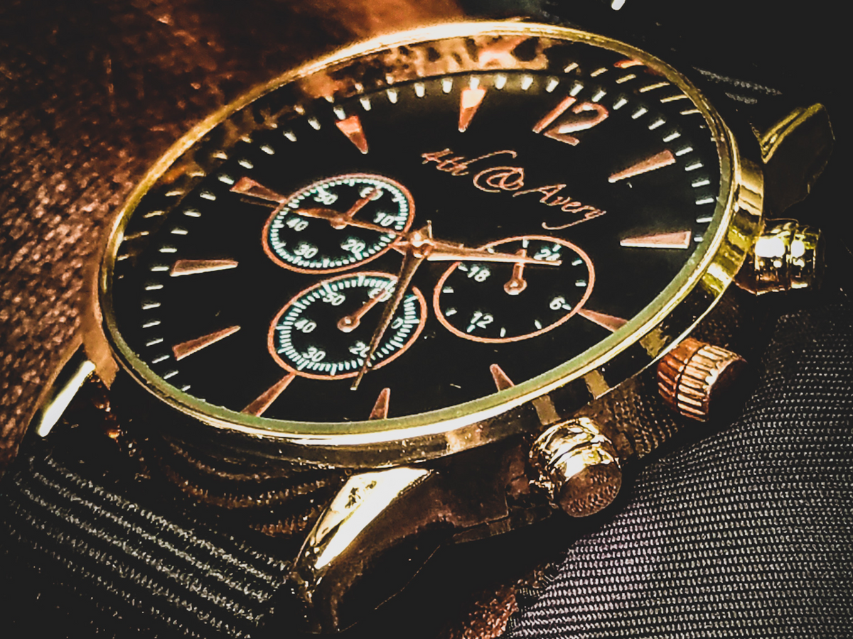 BLACK GOLD G10 watch on a black and gold nylon NATO strap